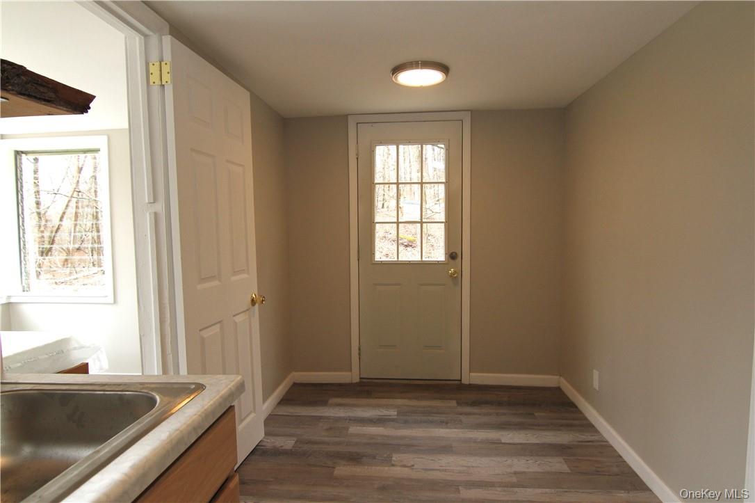 71 Miller Road, Unit 6 Hopewell Junction, NY 12533 - Photo 6 of 22 a view of an empty room and window