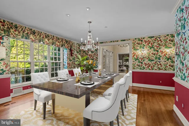 a kitchen with counter top space and windows