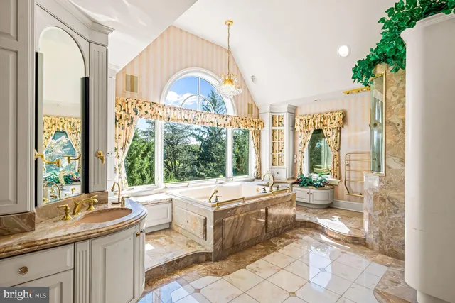a kitchen with stainless steel appliances granite countertop a stove and a sink