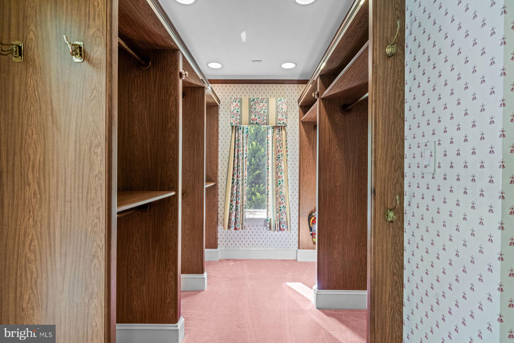1225 Country Club Road Gladwyne, PA 19035 - Photo 42 of 89 a view of a hallway with wooden floor and entryway