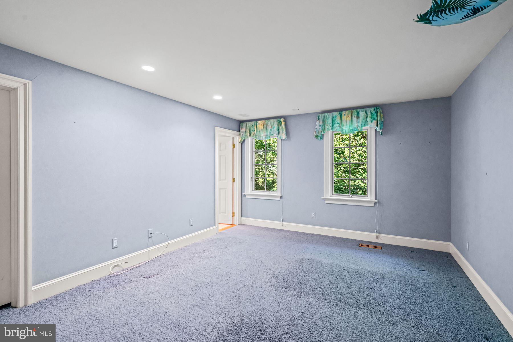 1225 Country Club Road Gladwyne, PA 19035 - Photo 56 of 89 an empty room with windows