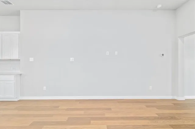 a view of a room with an empty space