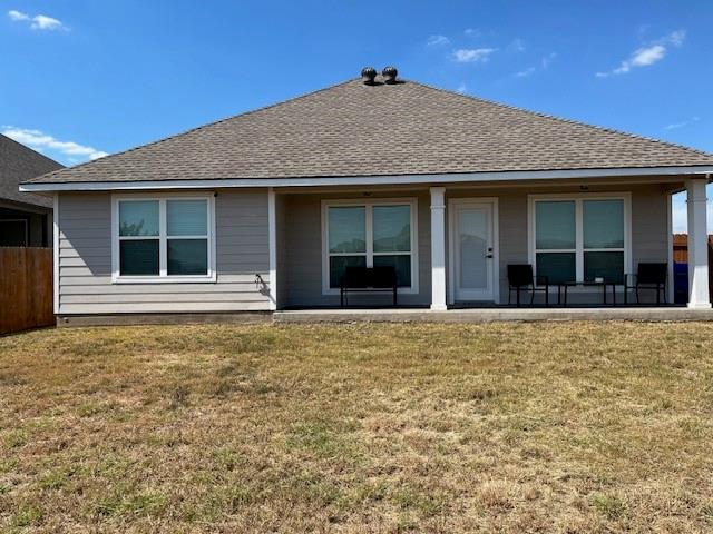 4013 Bravo Ranch Road Waco, TX 76705 - Photo 6 of 33 Rear view of house with roof with shingles and a patio