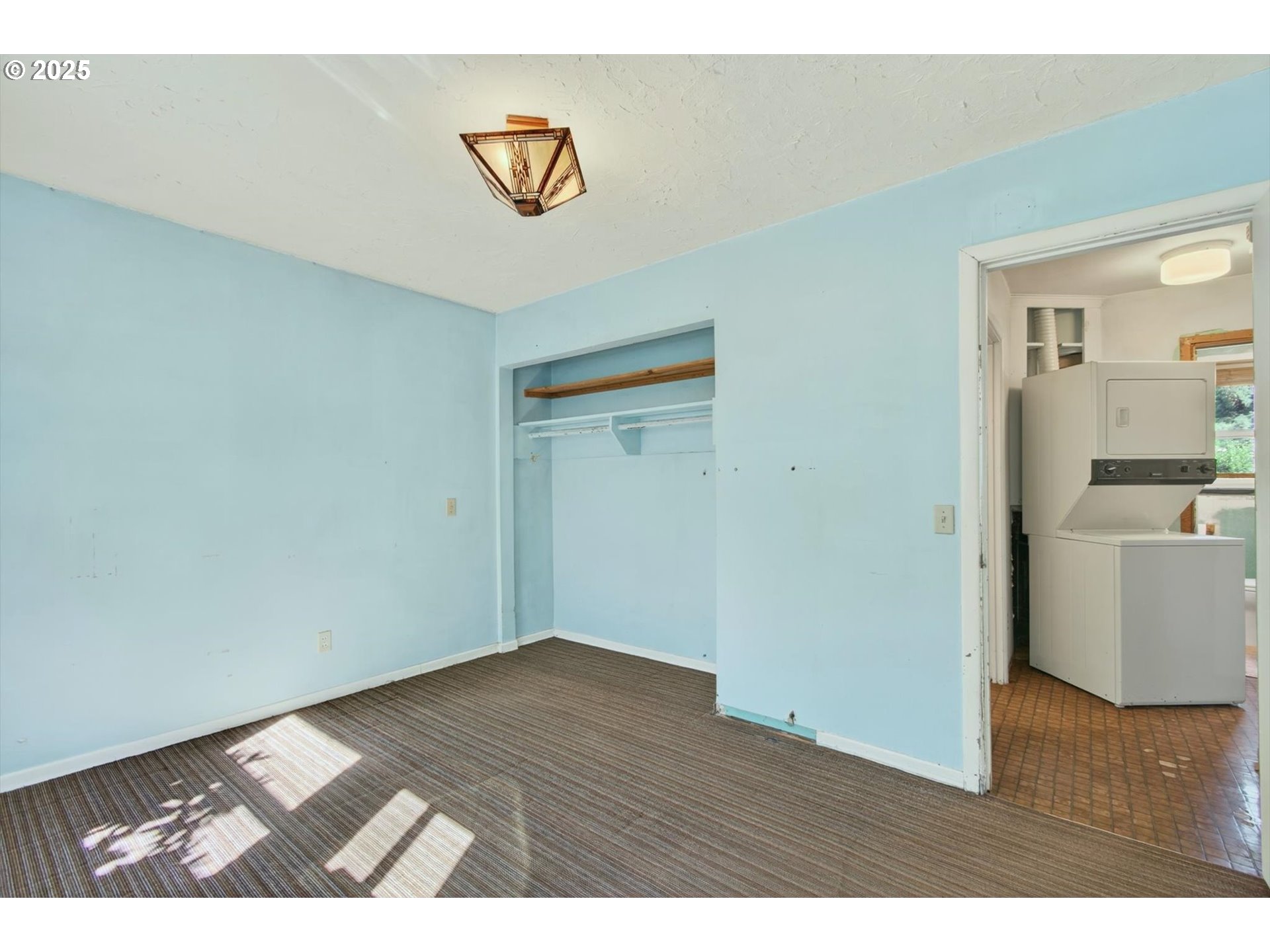 3945 Northeast Bryant Street Portland, OR 97211 - Photo 17 of 31 a view of an empty room and wooden floor