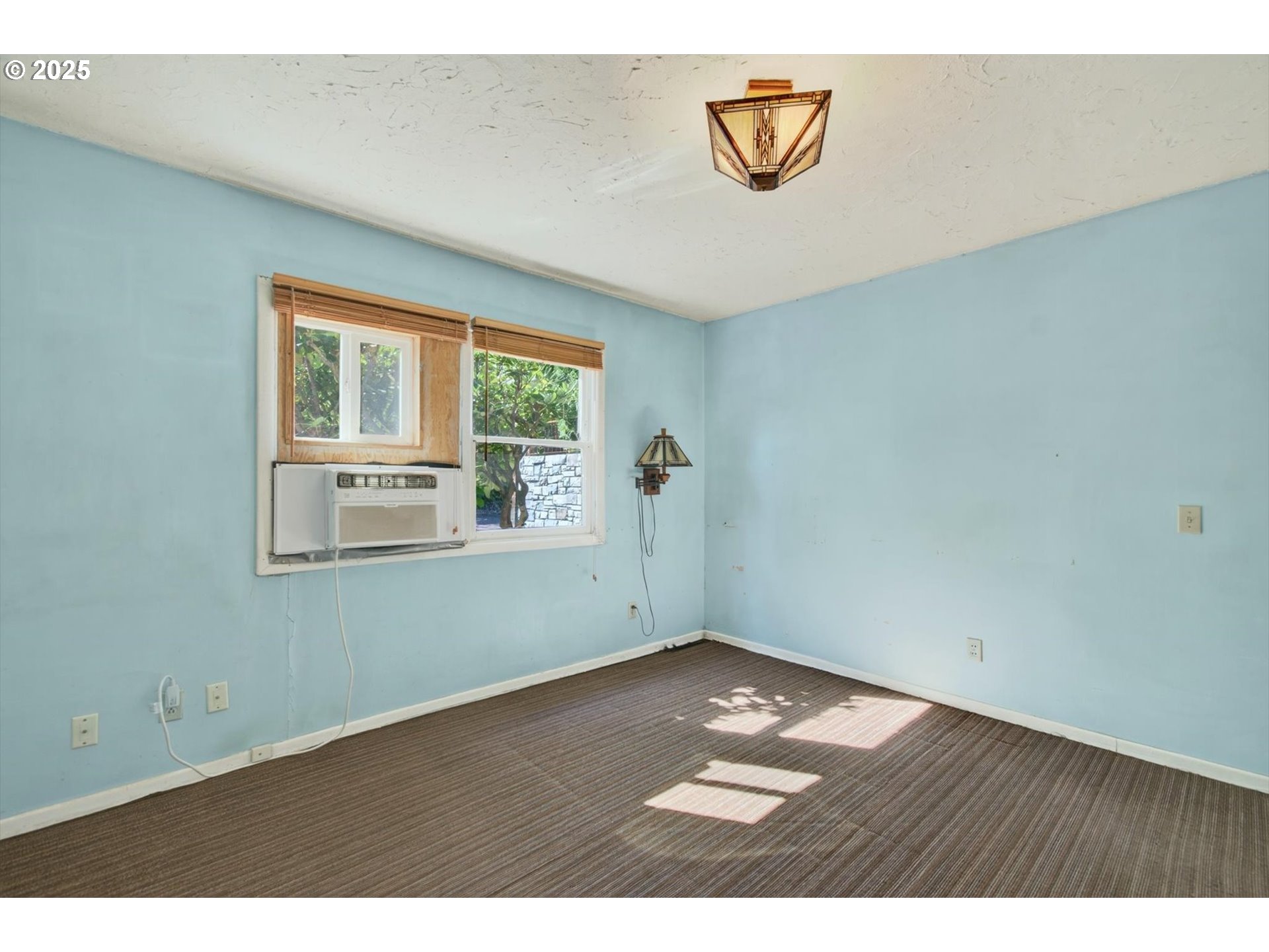 3945 Northeast Bryant Street Portland, OR 97211 - Photo 18 of 31 an empty room with a window