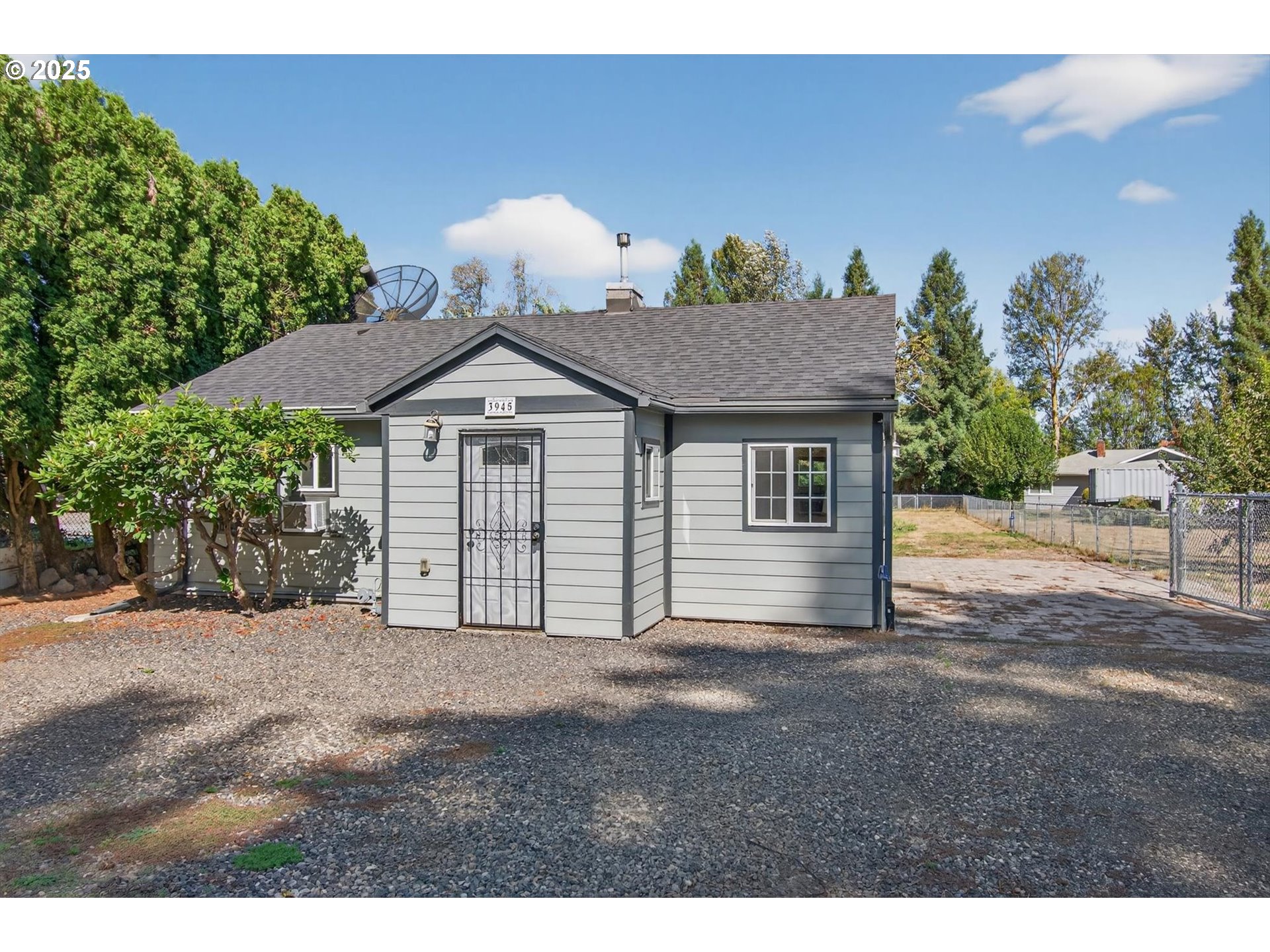 3945 Northeast Bryant Street Portland, OR 97211 - Photo 23 of 31 a front view of a house with a garden