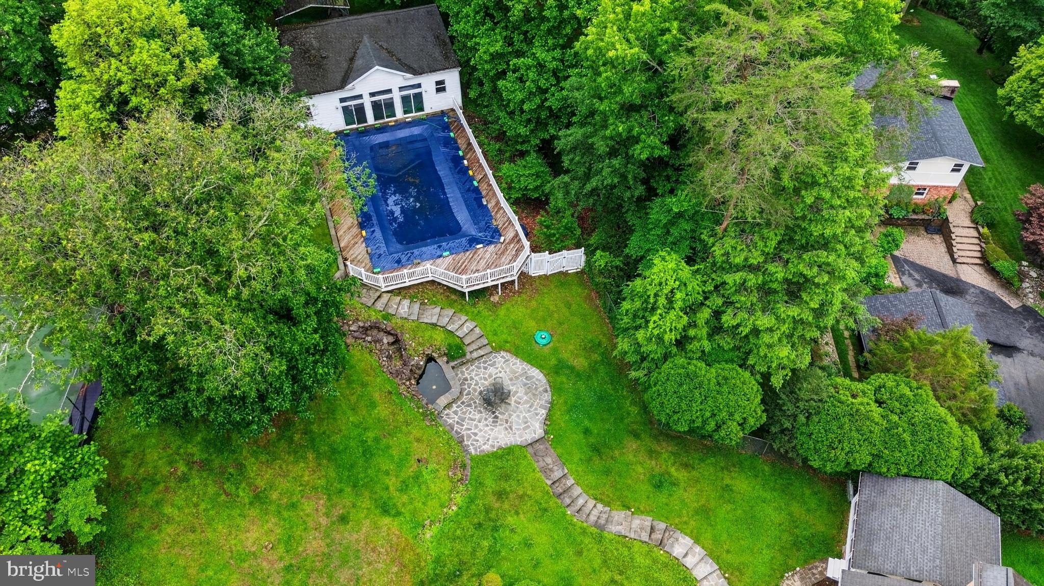 10320 Glen Road Potomac, MD 20854 - Photo 74 of 75 an aerial view of residential house with outdoor space and trees all around