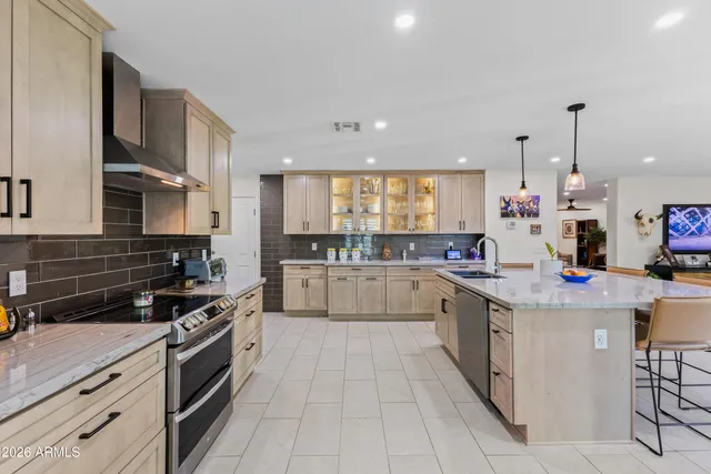 a view of an empty room and a window