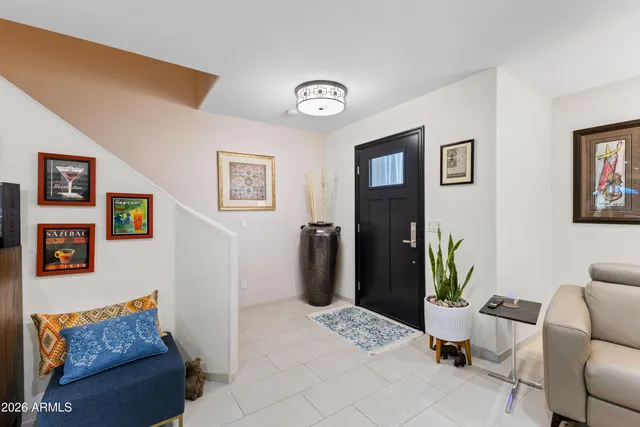a living room with furniture and a couch