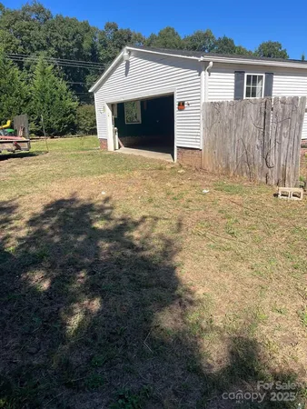 a house with yard in front of it