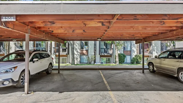 a car parked in front of garage