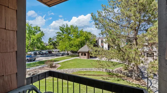 a view of swimming pool from a balcony