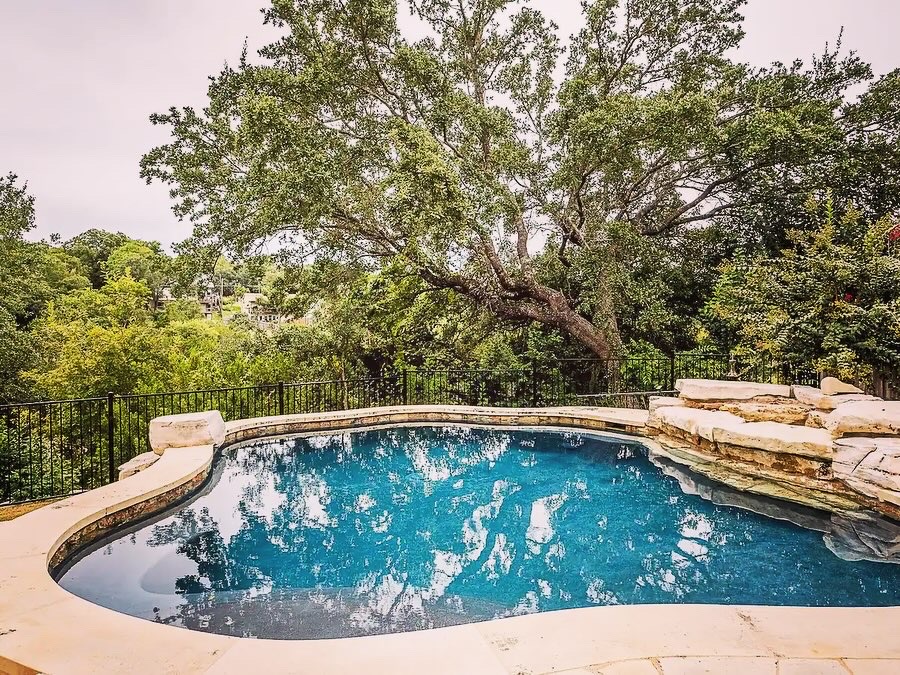 16308 Lake Loop Austin, TX 78734 - Photo 6 of 11 a view of swimming pool from a yard