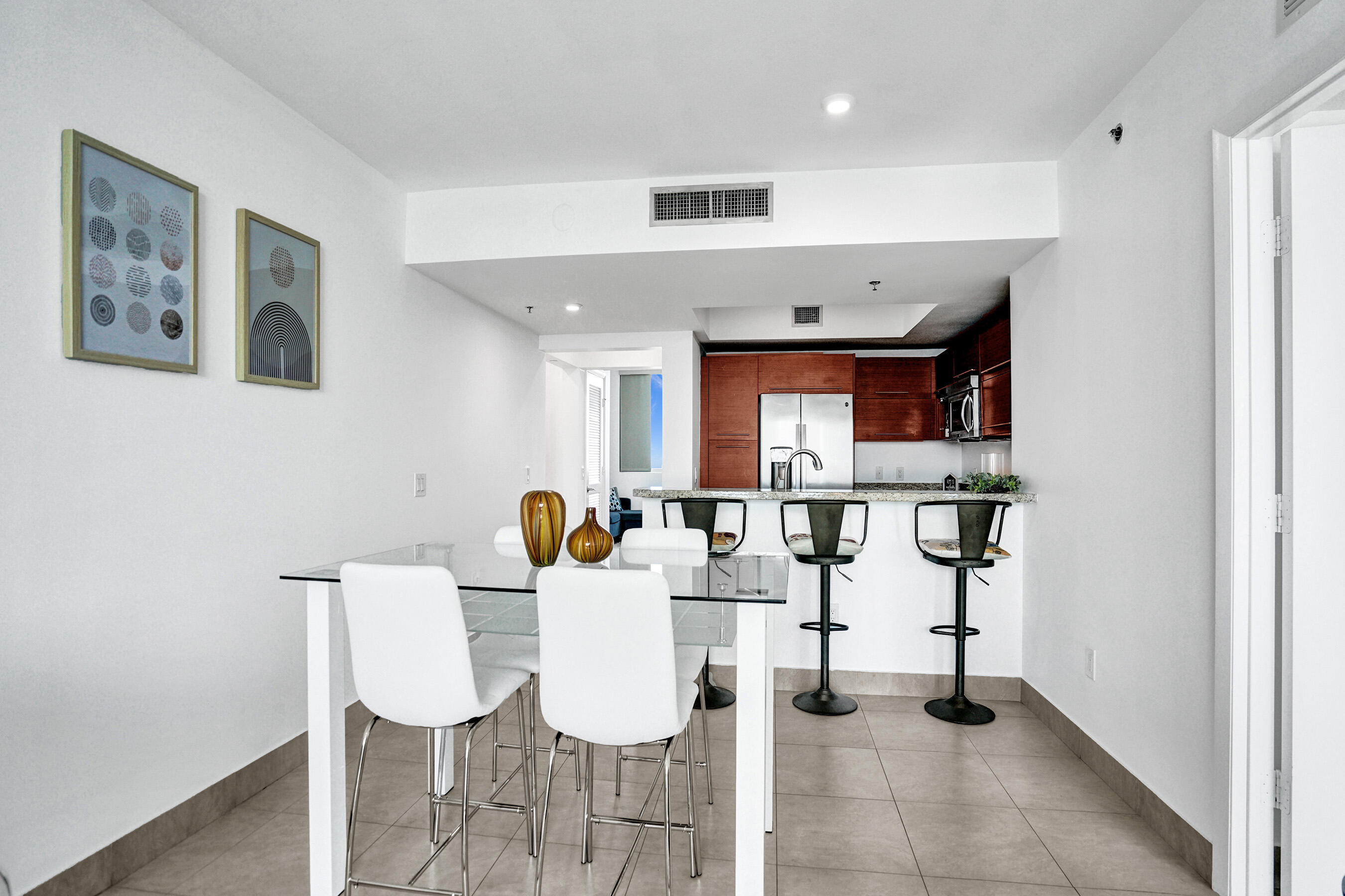2641 North Flamingo Road, Unit 2105N Sunrise, FL 33323 - Photo 21 of 60 a view of a dining room with furniture