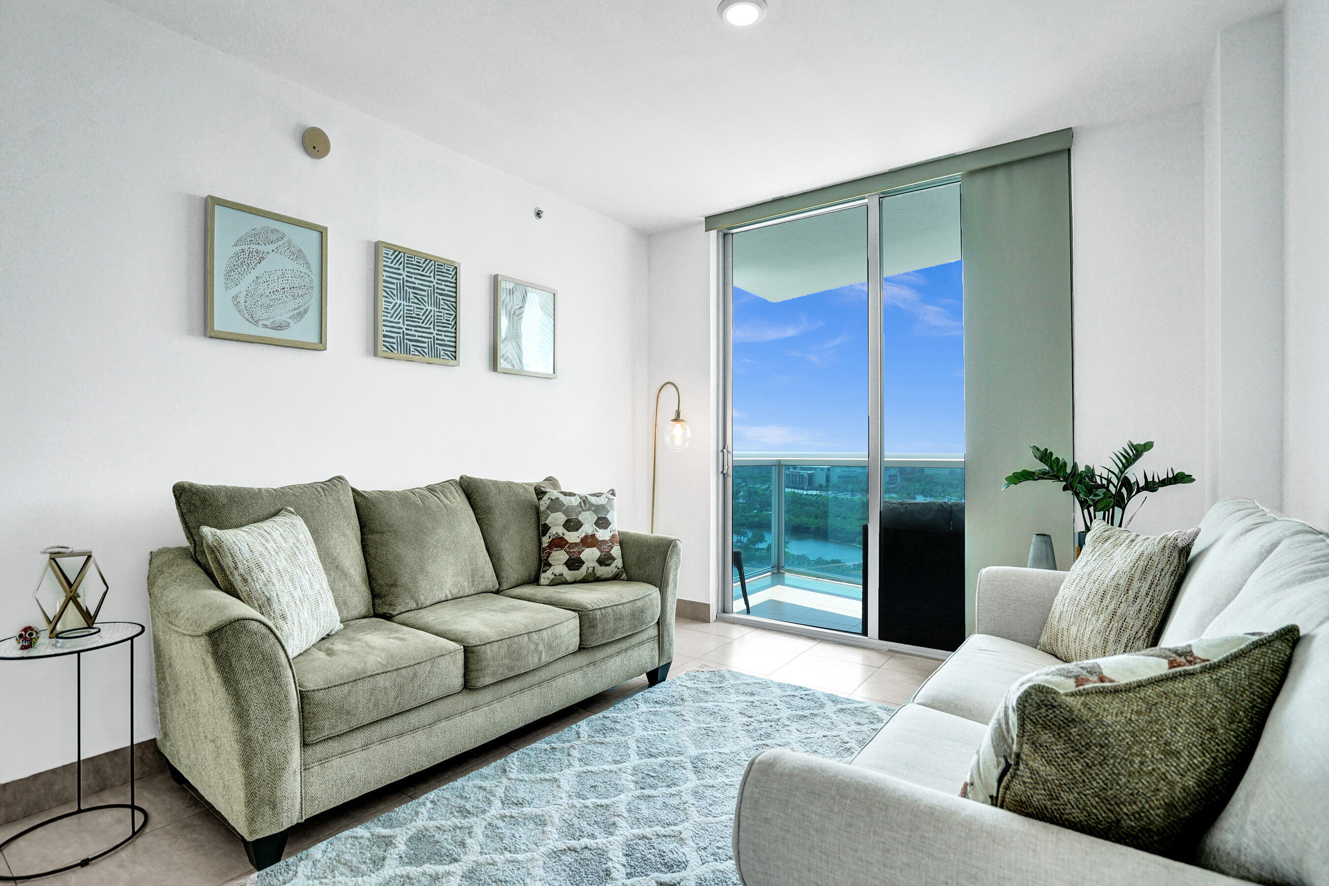 2641 North Flamingo Road, Unit 2105N Sunrise, FL 33323 - Photo 26 of 60 a living room with furniture and a large window