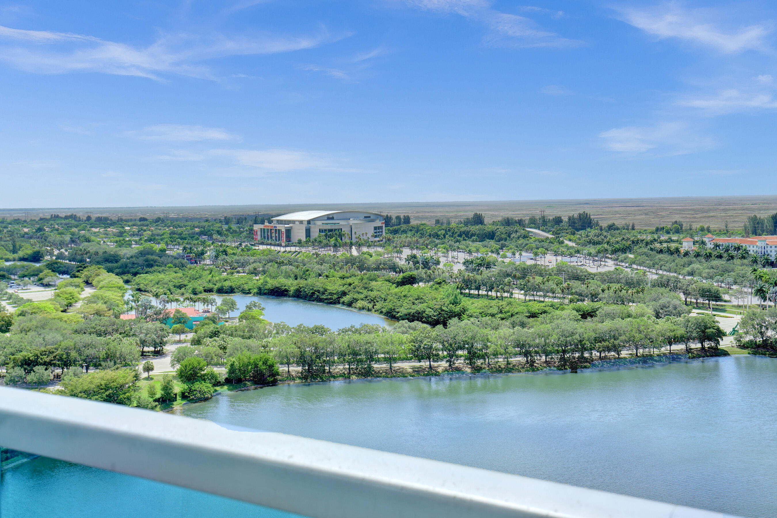2641 North Flamingo Road, Unit 2105N Sunrise, FL 33323 - Photo 30 of 60 an aerial view of a house with a yard and lake view
