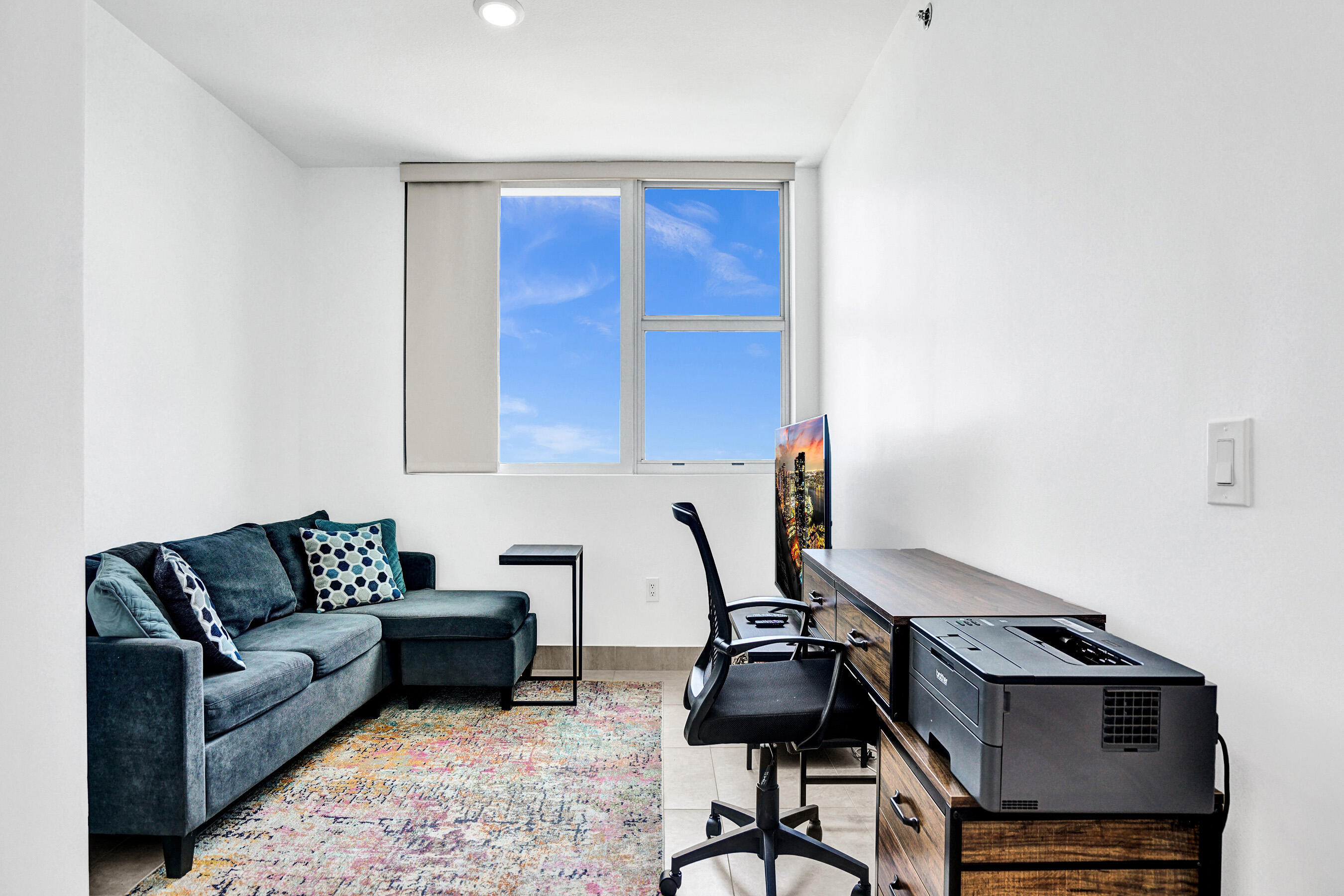 2641 North Flamingo Road, Unit 2105N Sunrise, FL 33323 - Photo 32 of 60 a living room with furniture a piano and a window