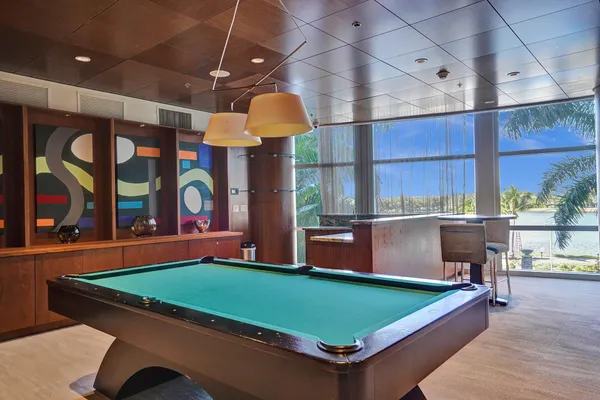 a view of a swimming pool with a patio