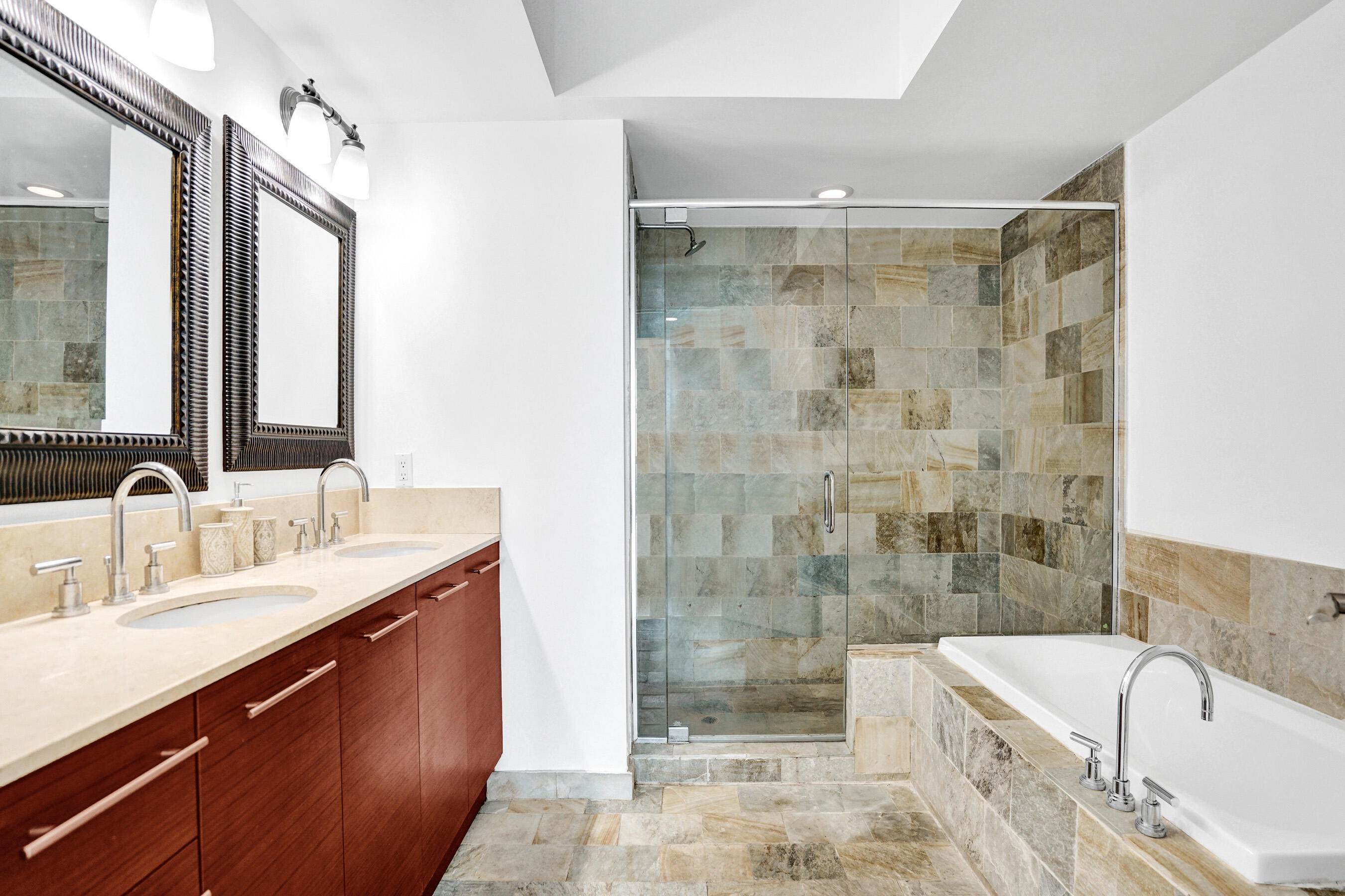 2641 North Flamingo Road, Unit 2105N Sunrise, FL 33323 - Photo 9 of 60 a bathroom with a bathtub shower sink mirror and toilet