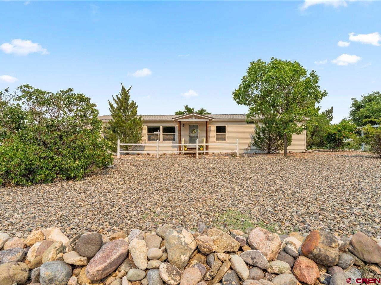 2602 1600th Road Delta, CO 81416 - Photo 1 of 42 a front view of a house with a yard