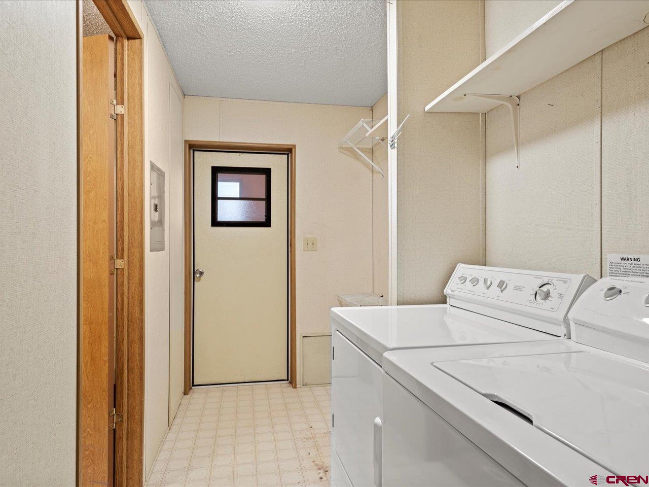 2602 1600th Road Delta, CO 81416 - Photo 16 of 42 a utility room with dryer and washer