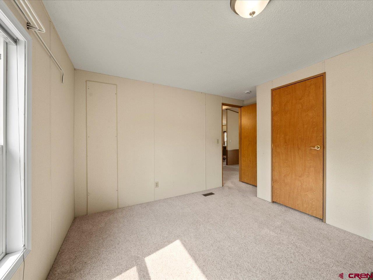 2602 1600th Road Delta, CO 81416 - Photo 25 of 42 a view of an empty room and a window