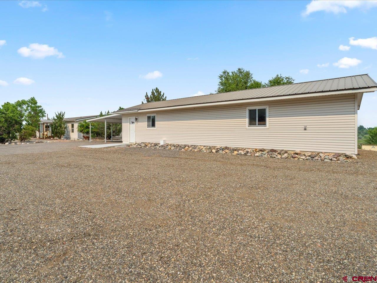 2602 1600th Road Delta, CO 81416 - Photo 38 of 42 a view of a house with a backyard