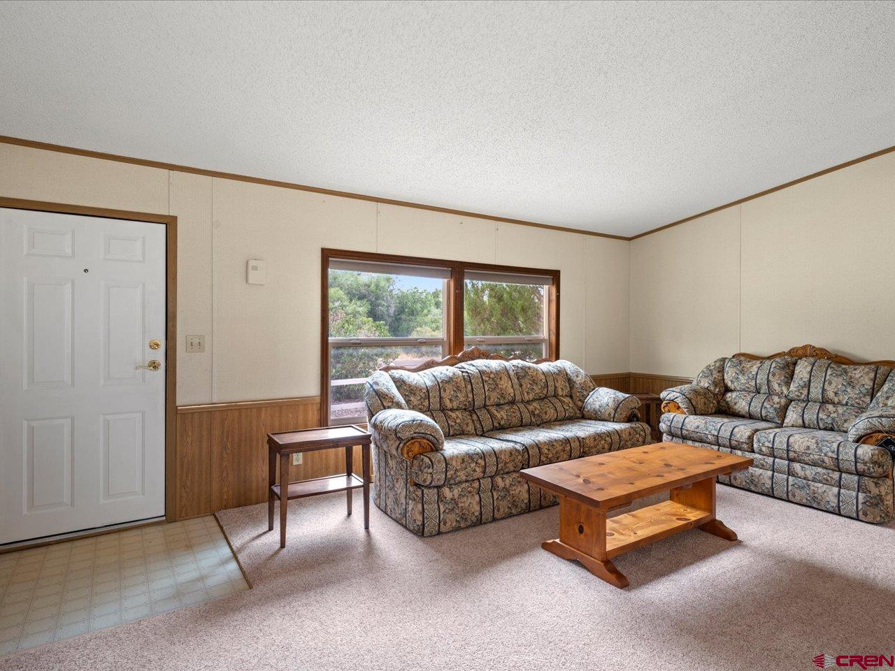 2602 1600th Road Delta, CO 81416 - Photo 4 of 42 a living room with furniture and a window