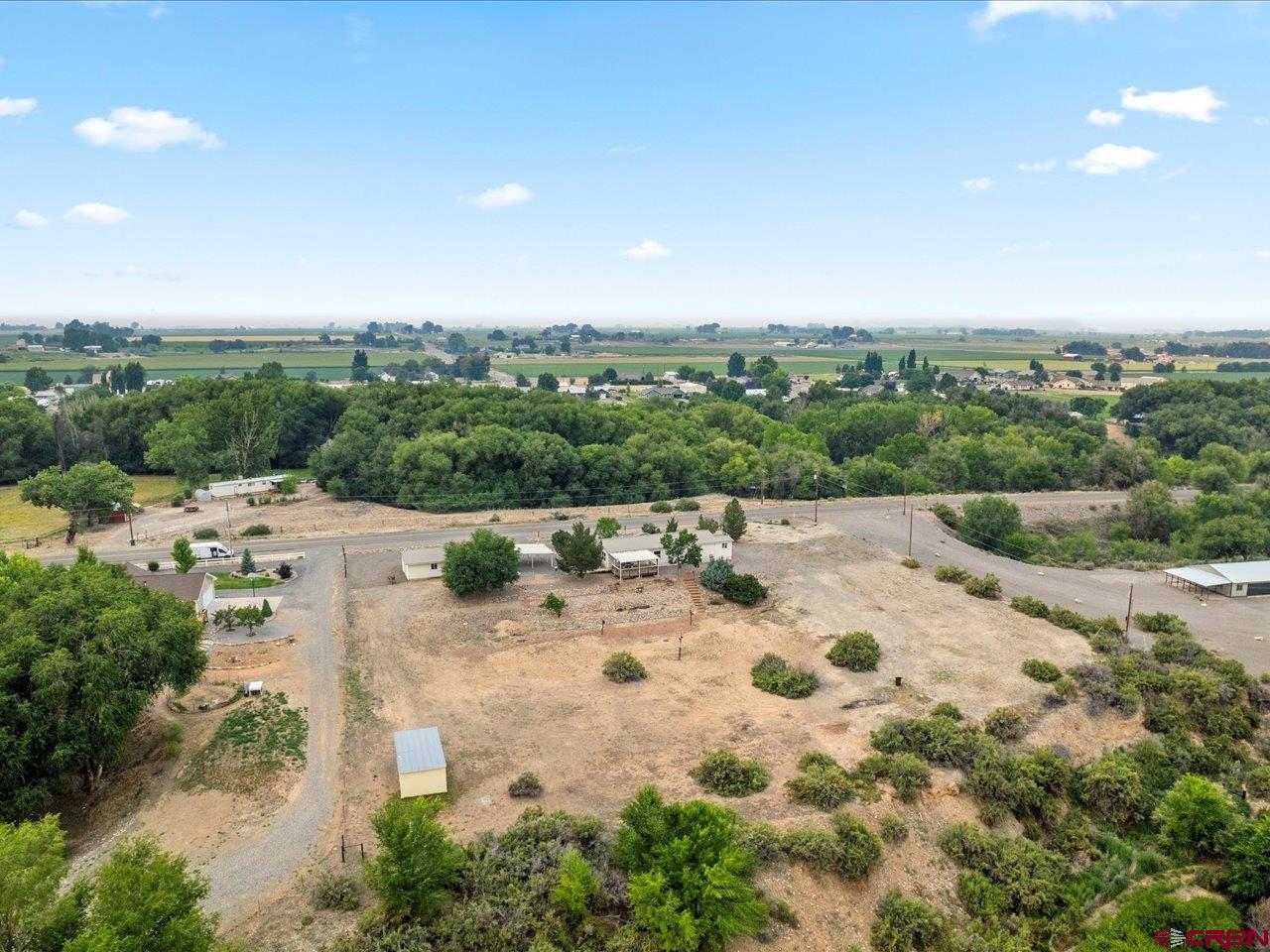 2602 1600th Road Delta, CO 81416 - Photo 41 of 42 a view of a terrace with a garden