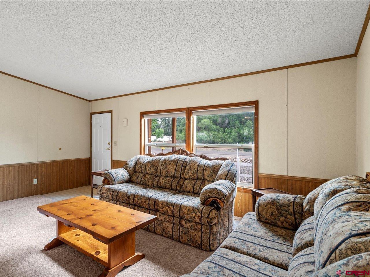 2602 1600th Road Delta, CO 81416 - Photo 5 of 42 a living room with furniture and a window