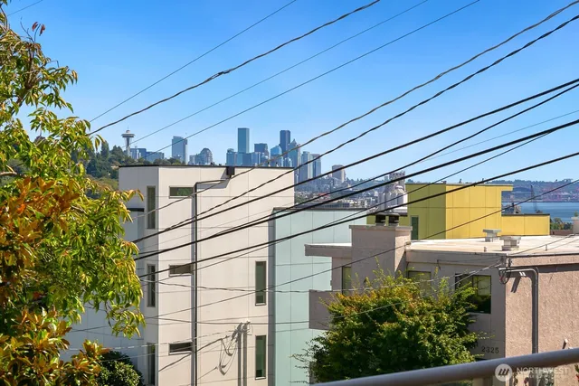 a large building with a clock tower in middle