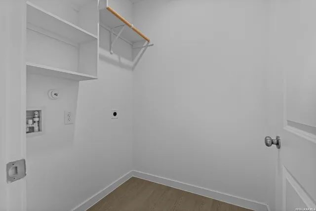 a view of small space with racks on the wall