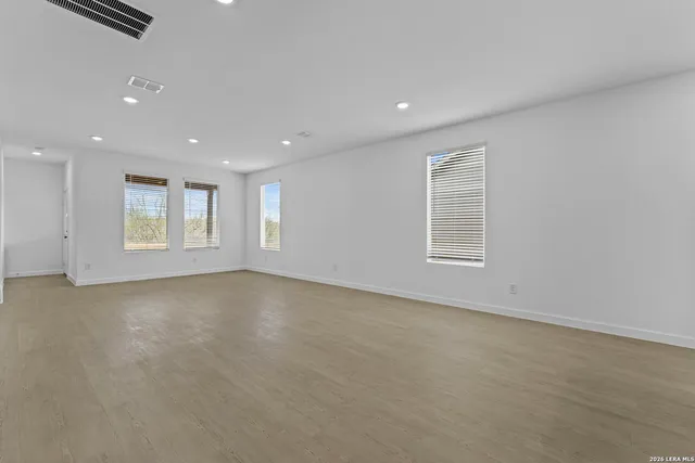 an empty room with windows