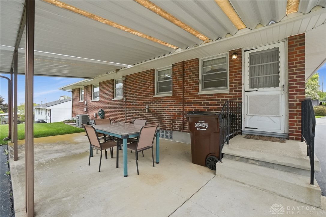 877 Woodhill Road Riverside, OH 45431 - Photo 39 of 42 This inviting patio space features a practical covered area for year-round enjoyment.