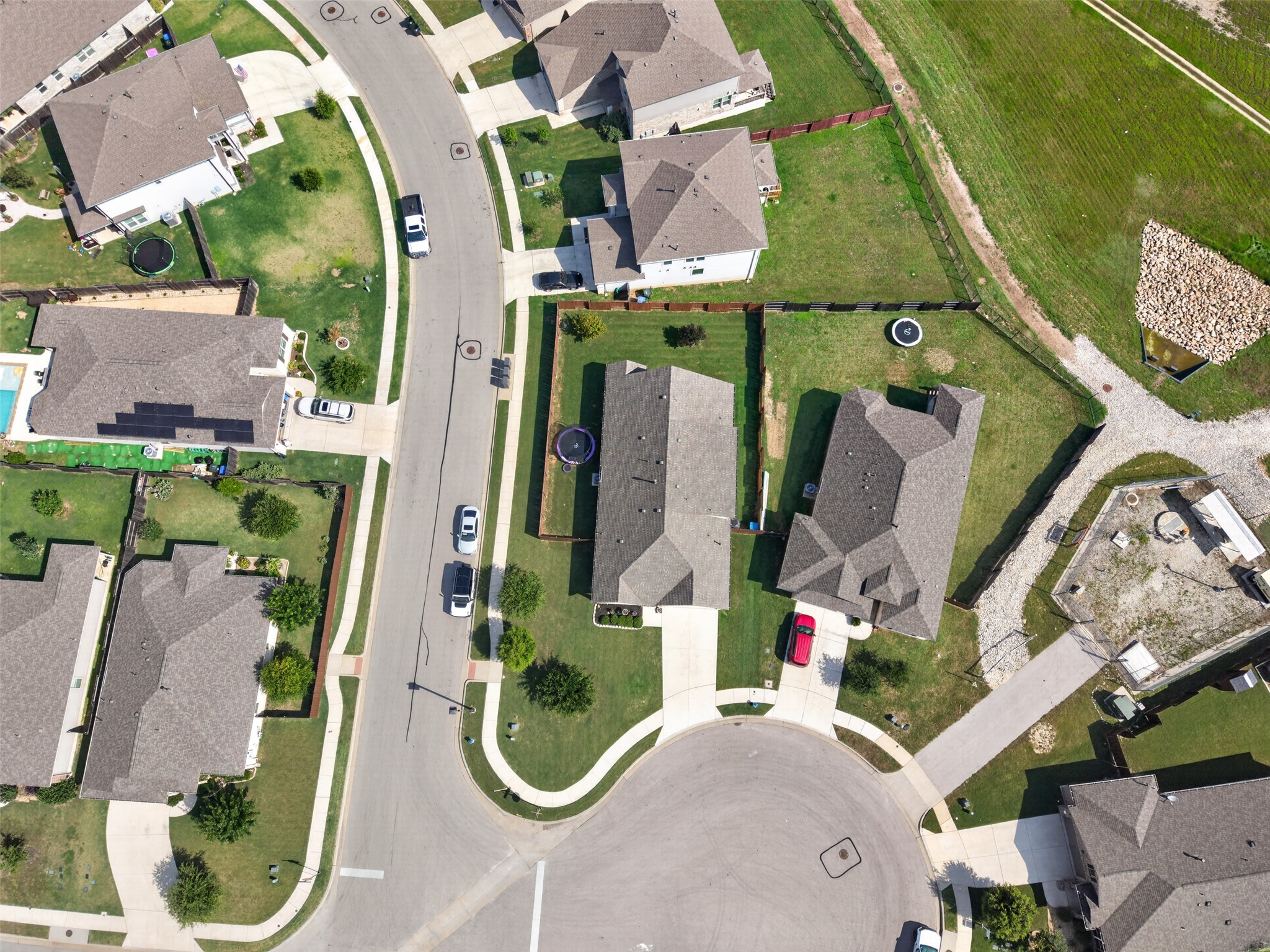 1009 Bright Star Cove Georgetown, TX 78628 - Photo 31 of 40 an aerial view of residential house with outdoor space and parking
