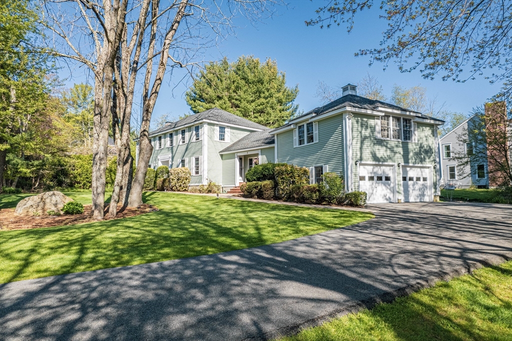 7 Apache Avenue Andover, MA 01810 - Photo 2 of 5 a front view of a house with a yard