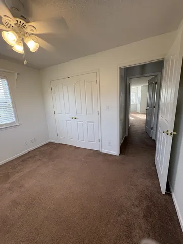 a view of a livingroom with a staircase