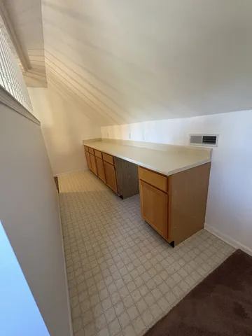 an empty room with stairs