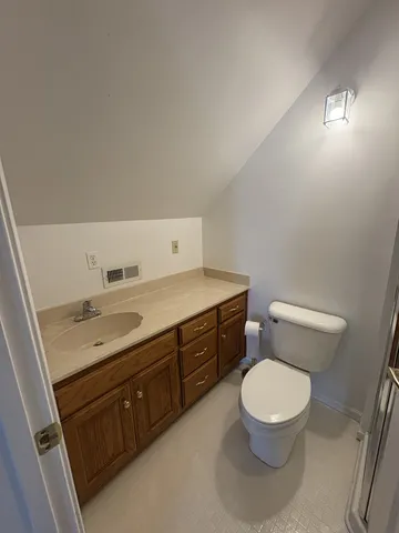 a view of a green field with clear sky