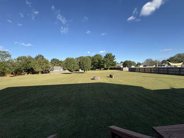 a view of a lake with a car parked