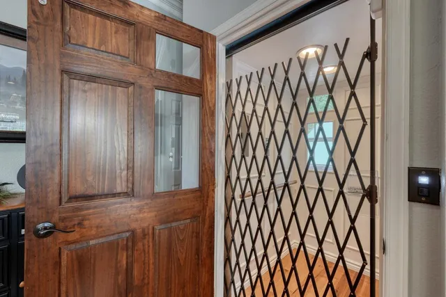 a view of a door and a window