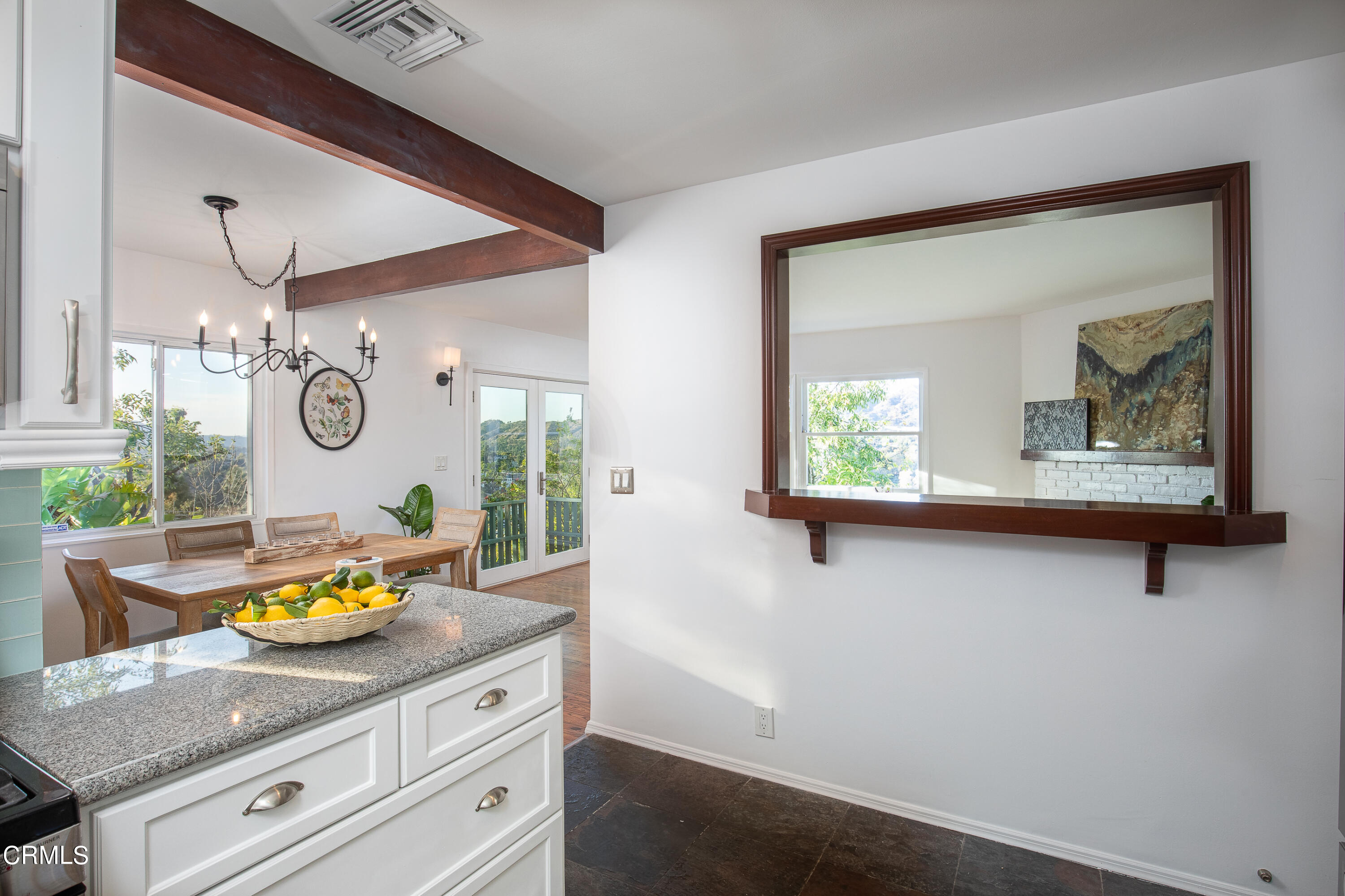 1850 Kaweah Drive Pasadena, CA 91105 - Photo 12 of 30 a bathroom with a granite countertop sink a mirror and window