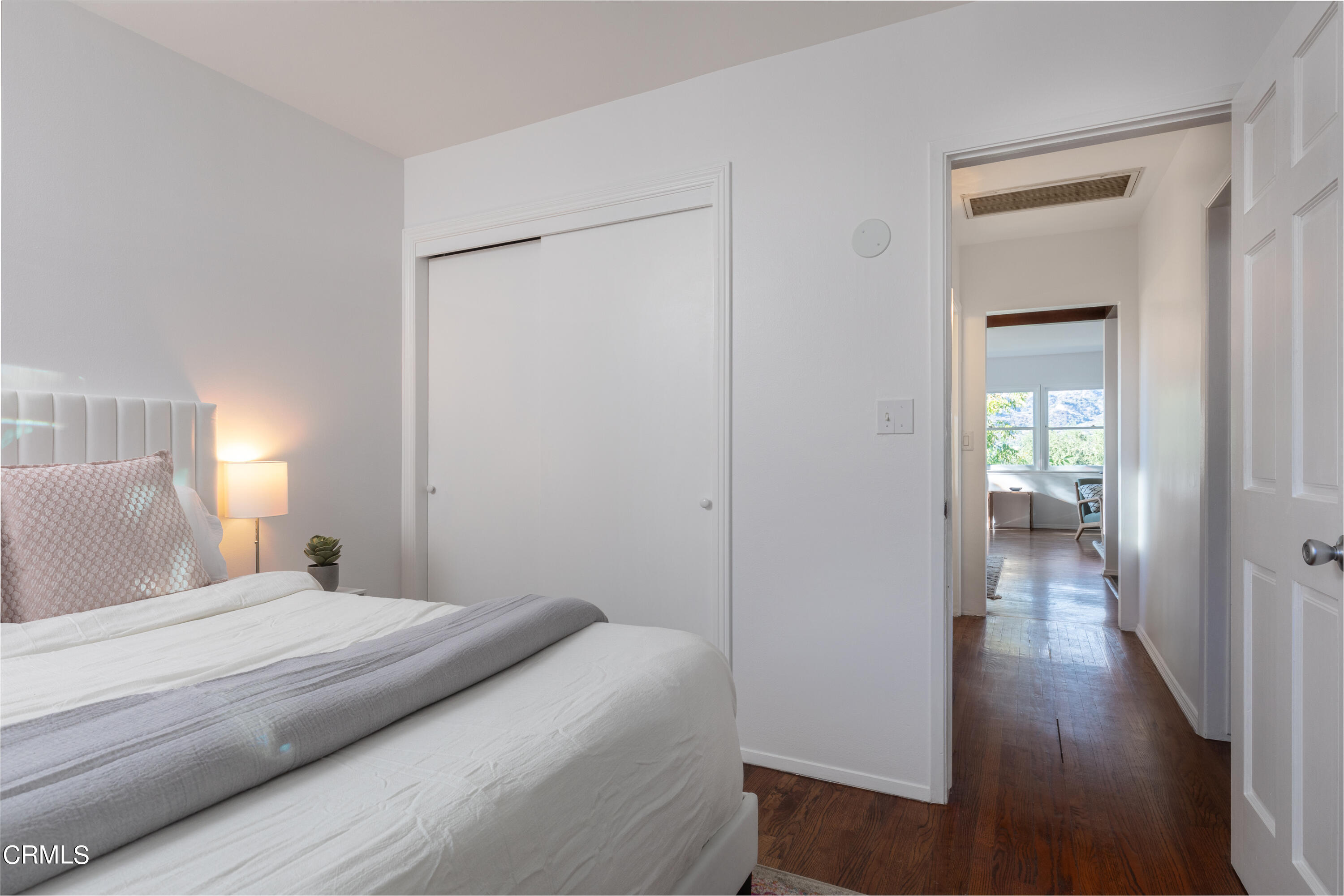 1850 Kaweah Drive Pasadena, CA 91105 - Photo 18 of 30 a bedroom with a bed and wooden floor