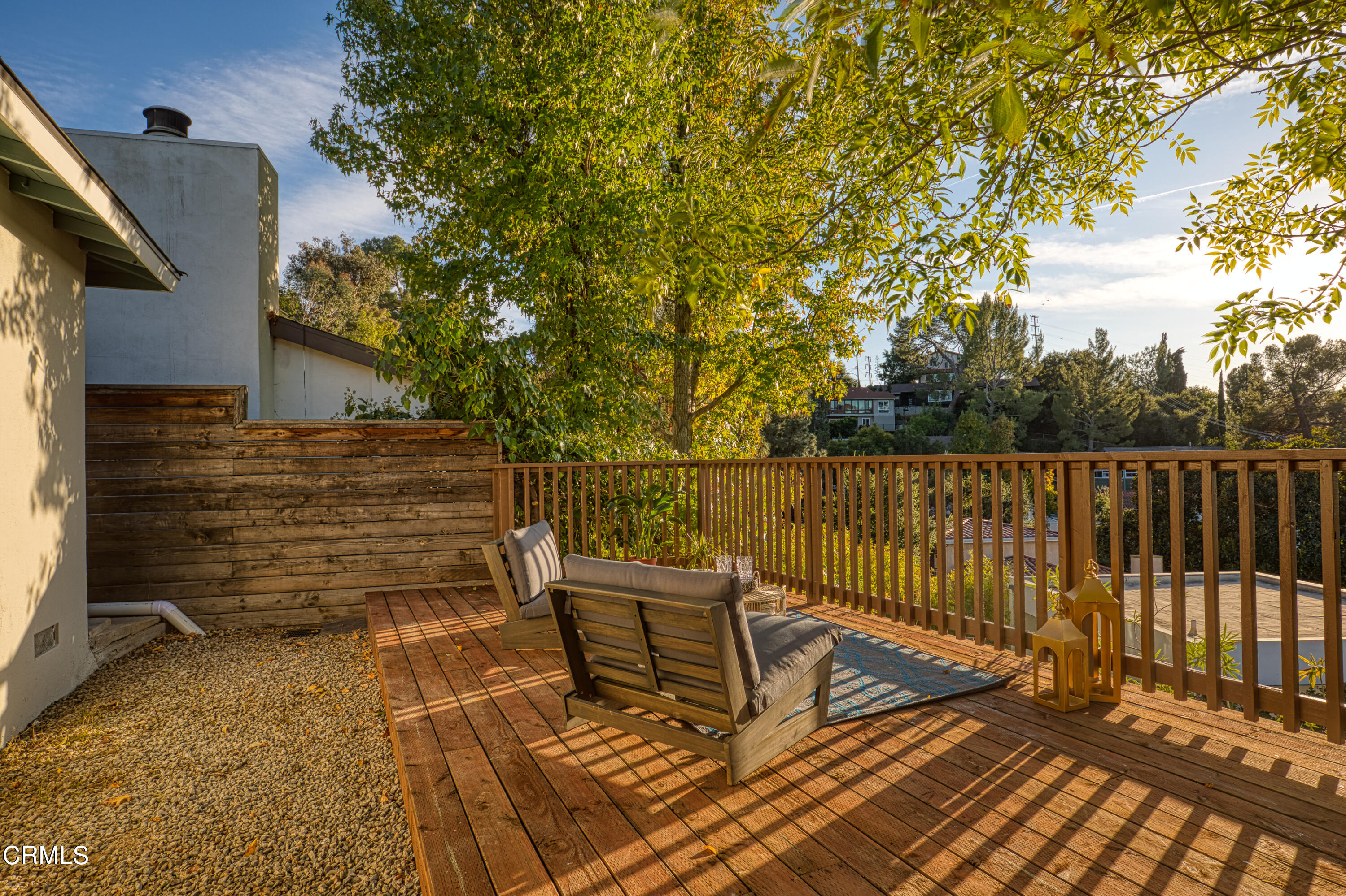 1850 Kaweah Drive Pasadena, CA 91105 - Photo 22 of 30 a roof deck with wooden floor and fence