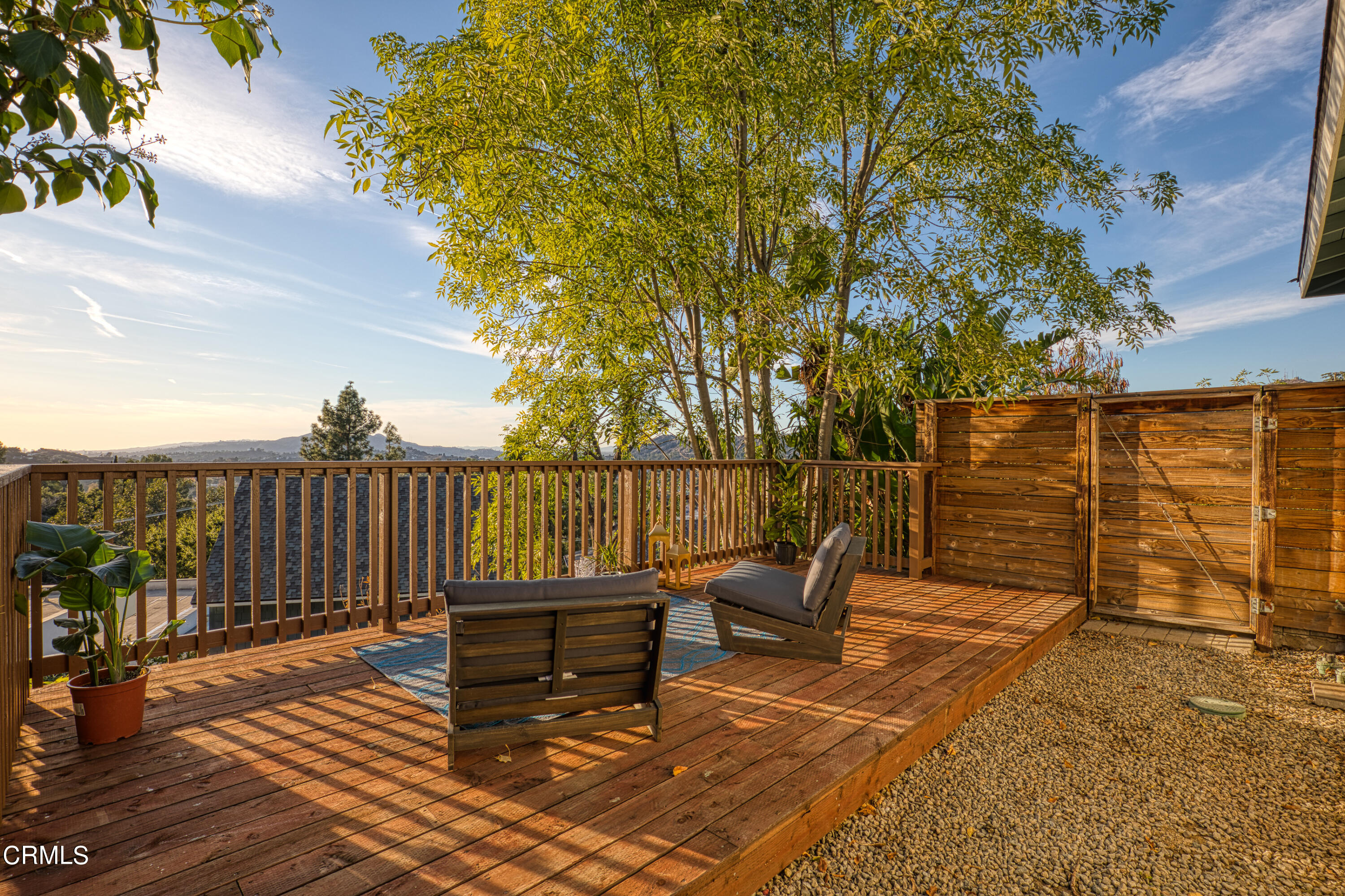1850 Kaweah Drive Pasadena, CA 91105 - Photo 23 of 30 a balcony with wooden floor outdoor seating and city view