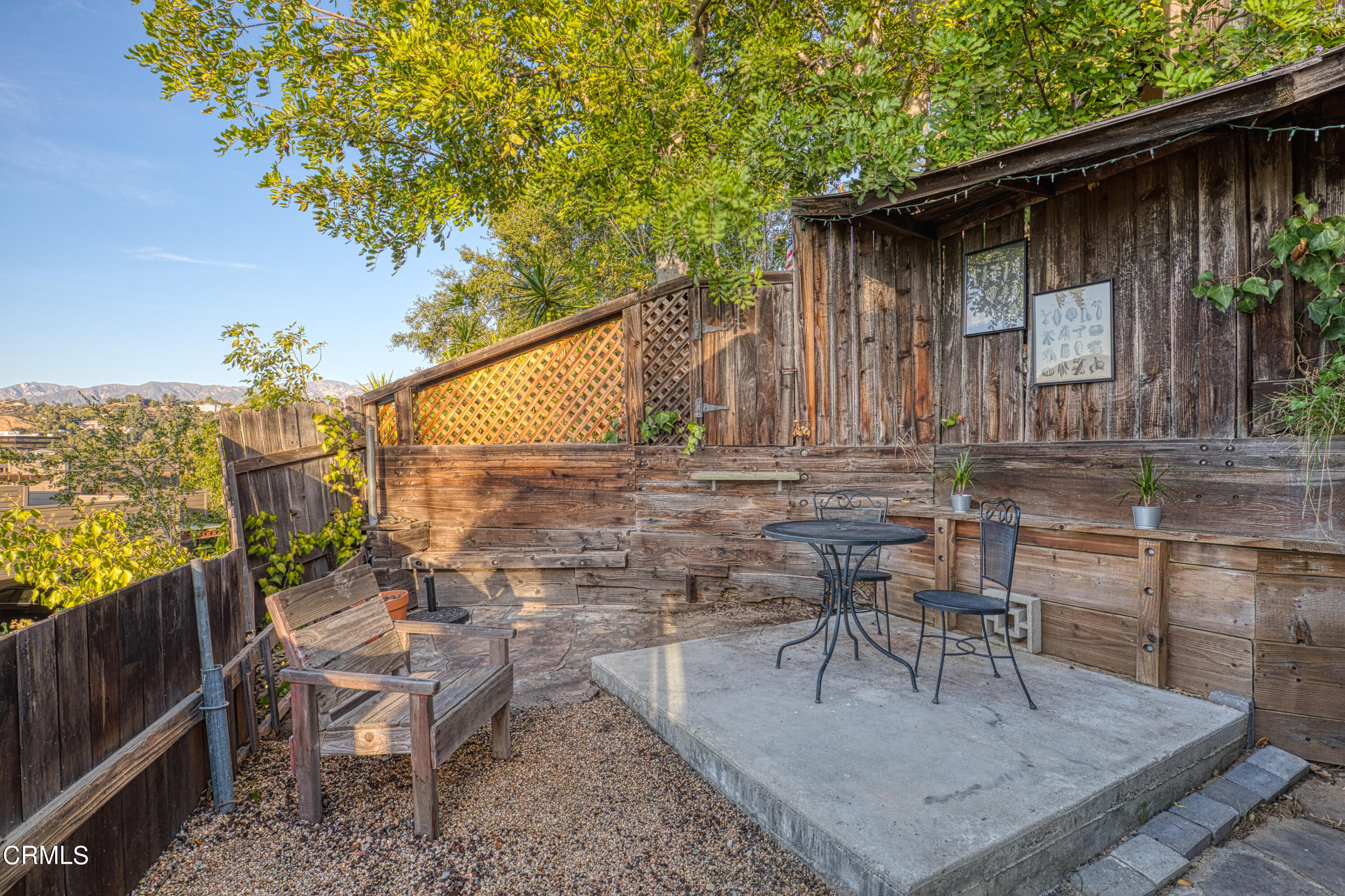 1850 Kaweah Drive Pasadena, CA 91105 - Photo 25 of 30 a backyard of a house with table and chairs