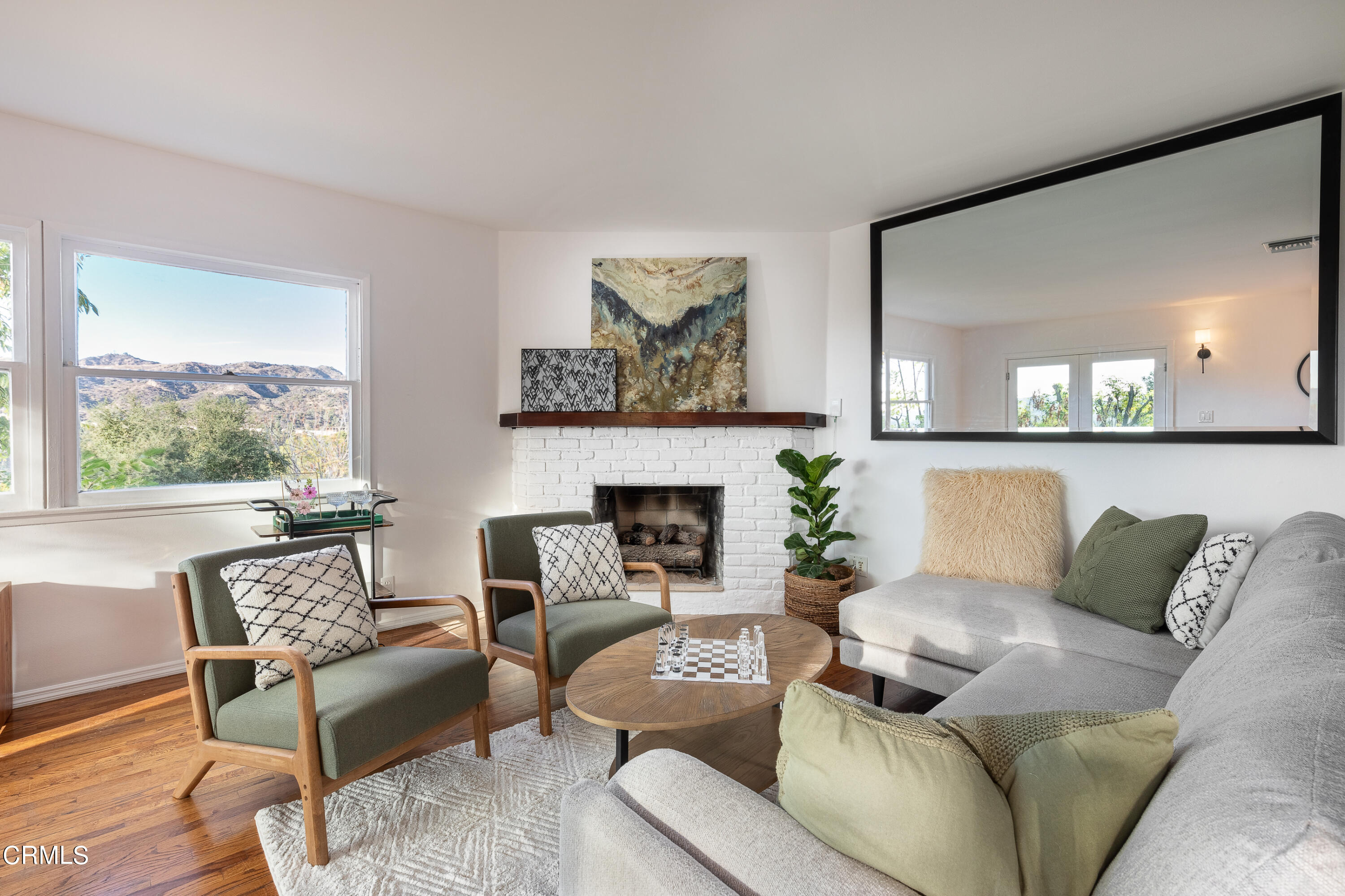 1850 Kaweah Drive Pasadena, CA 91105 - Photo 6 of 30 a living room with furniture and a fireplace