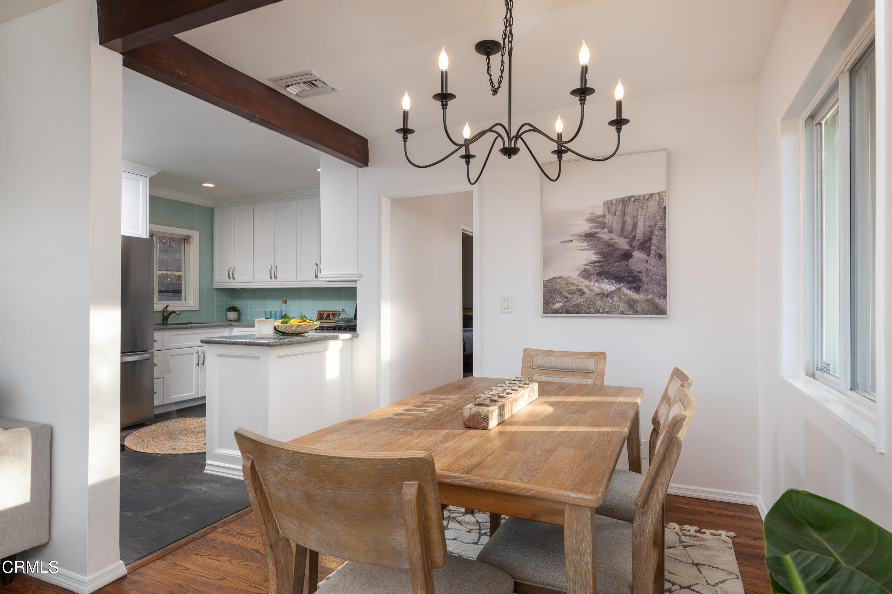 1850 Kaweah Drive Pasadena, CA 91105 - Photo 10 of 30 a view of a dining room with furniture a chandelier and wooden floor