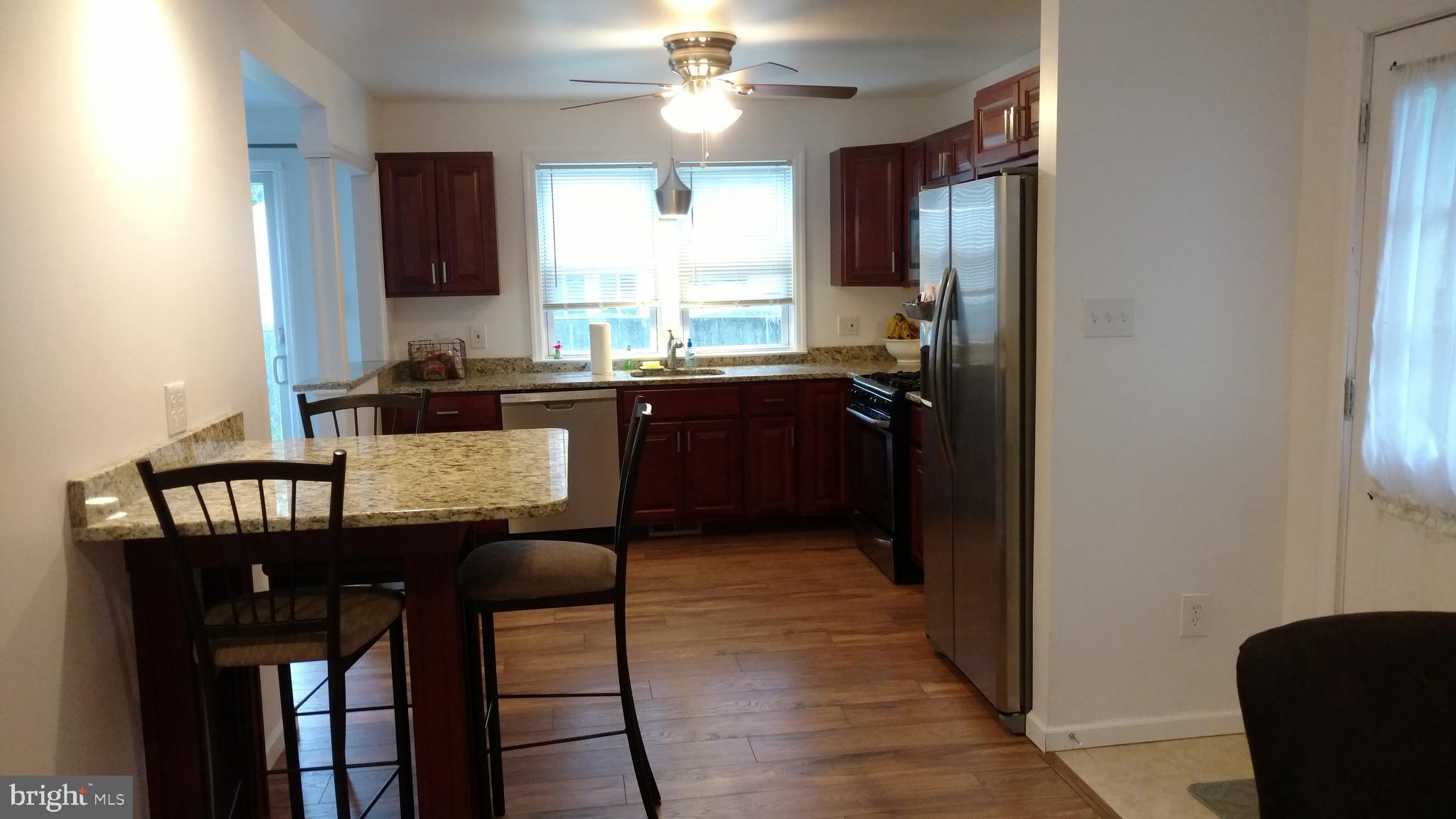 56 Shepherd Road Cherry Hill, NJ 08034 - Photo 3 of 15 Kitchen from living room and side door to carport