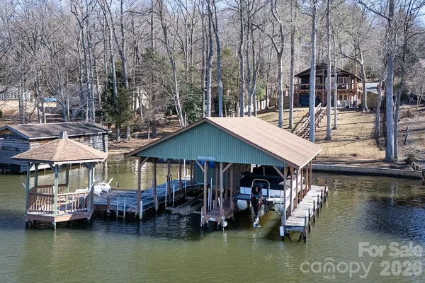 a view of a lake with sitting area